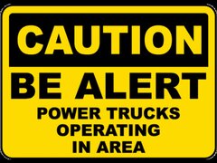 Power Trucks Operating Sign